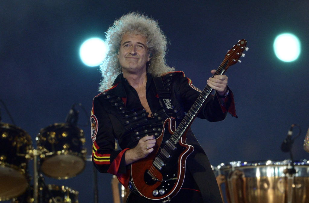 Queen's guitar player Brian May performs at the Olympic stadium during the closing ceremony of the 2012 London Olympic Games in London on August 12, 2012. Rio de Janeiro will host the 2016 Olympic Games. AFP PHOTO / ADRIAN DENNIS        (Photo credit should read ADRIAN DENNIS/AFP/GettyImages)