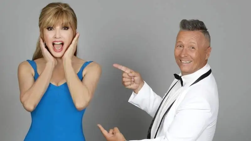 Paolo Belli elogia Milly Carlucci e la sua lunga collaborazione in "Ballando con le stelle", sottolineando la sua idoneità a condurre il Festival di Sanremo.